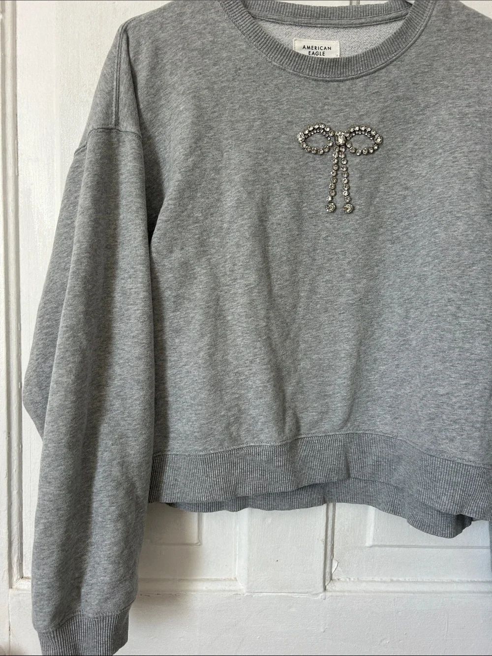 American Eagle Light Gray Crewneck Sweatshirt with Rhinestone Bow - Picture 7 of 8